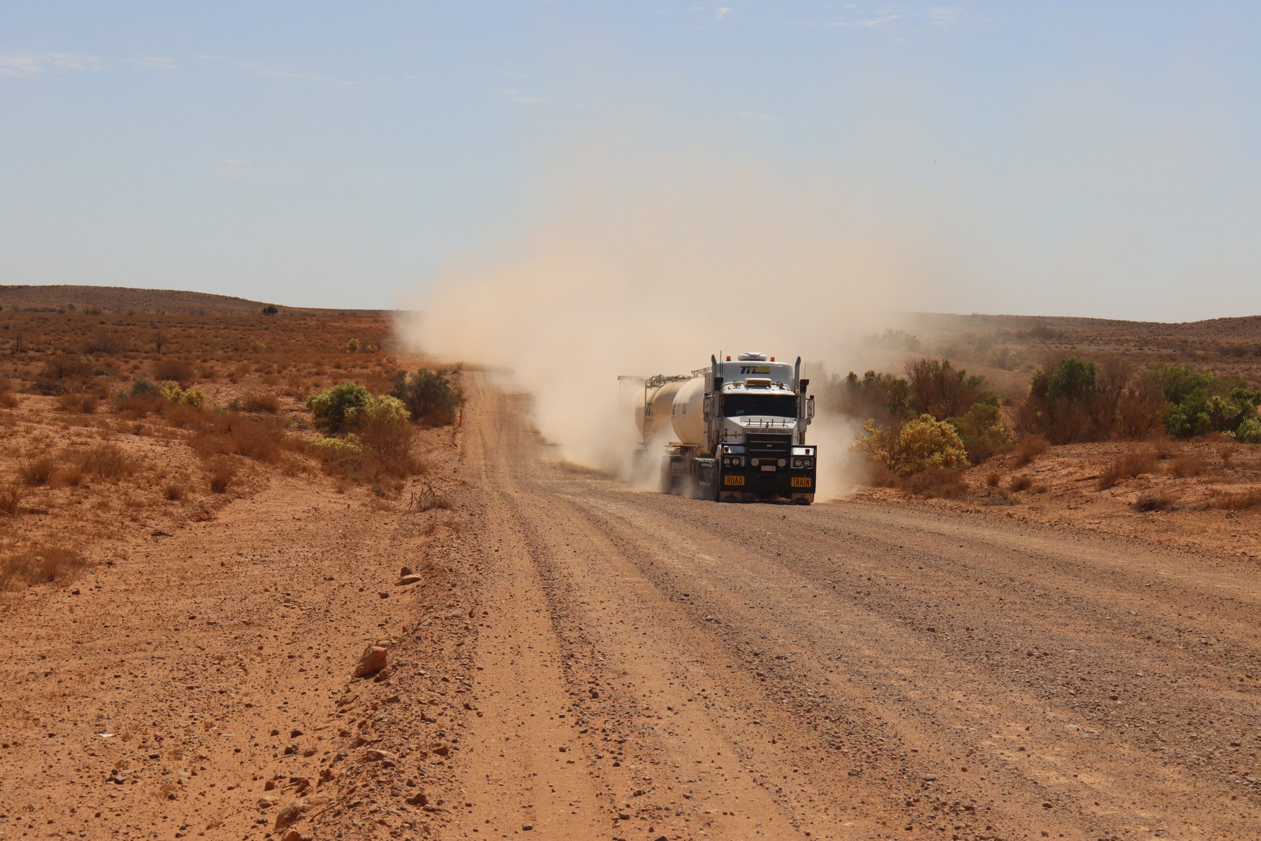truck driving through desert