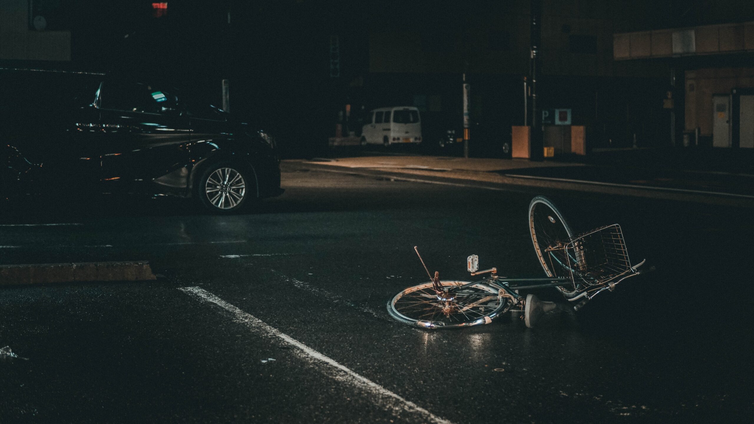bicycle lying on the road after accident