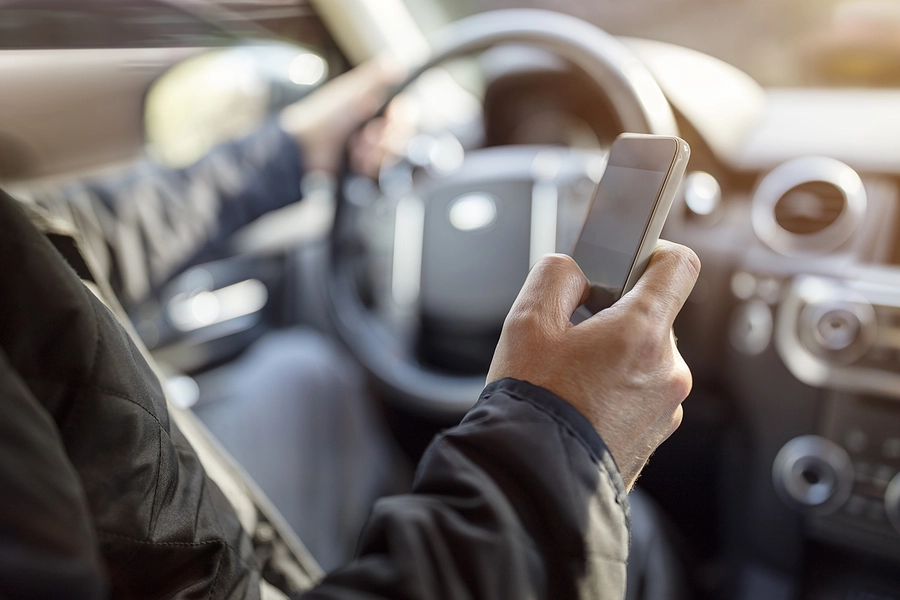 Person texting while driving